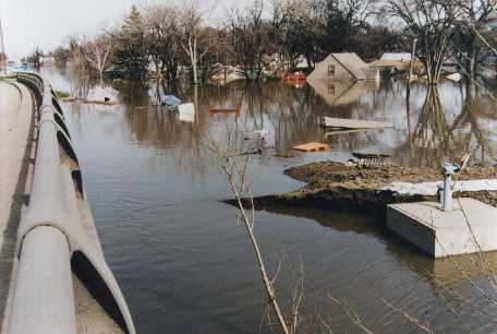 Flood waters, filled with every conceivable object and chemical, in East Grand Forks.