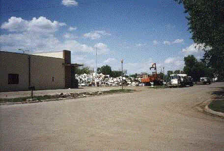 Hundreds of flooded washers, refrigerators, and other appliances stacked at a hauling site in Grand Forks, May, 1997