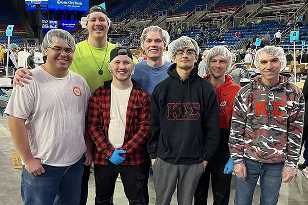 Greek life members volunteering