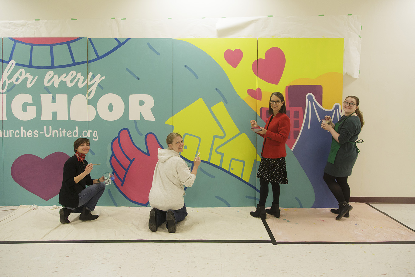 President Anne Blackhurst Painting United Way Community Mural