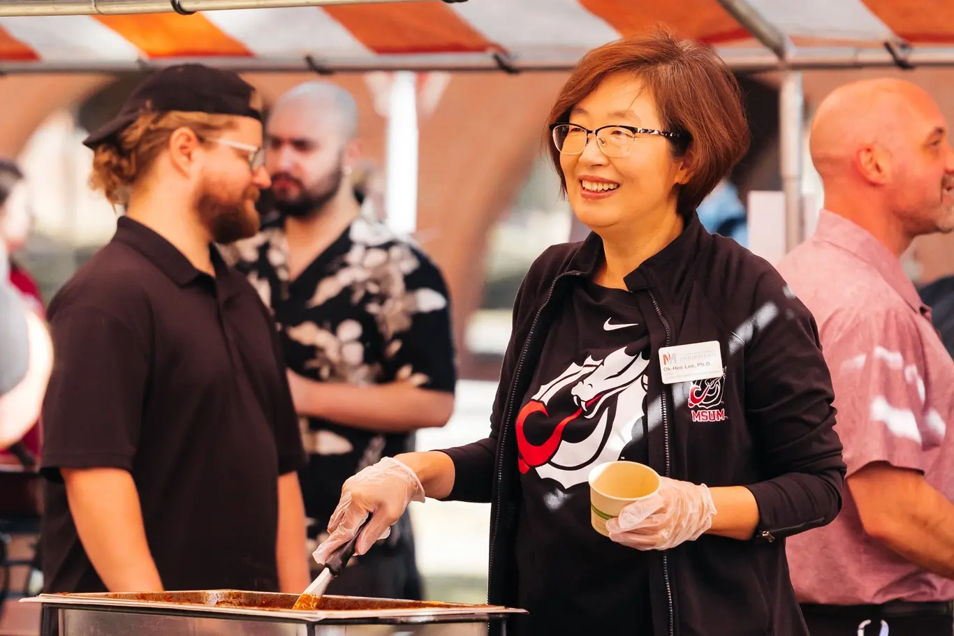Provost Lee participates in Deans' Chili Feed as CEHS Dean